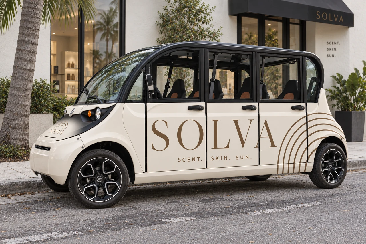 Illustrative ivory SOLVA wrap on an elongated three-door low-speed vehicle